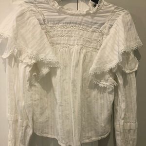 White ruffle blouse